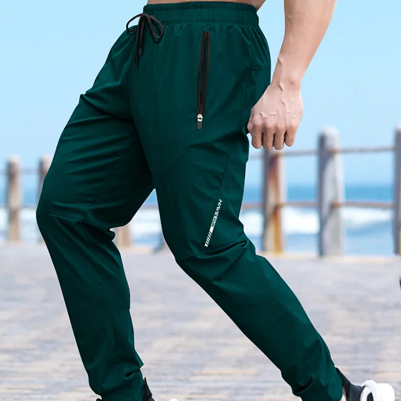 Men's Pants Summer Quick-drying Ice Silk Casual Pants Mens Ultra-thin Elastic Nine-point Loose Drape Solid Pants Men's Clothing